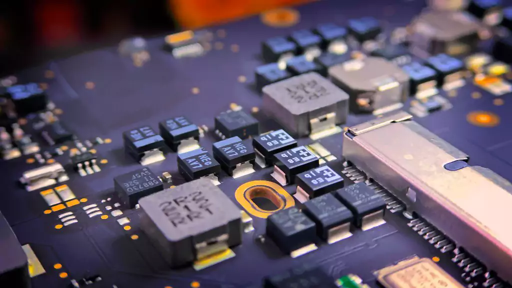 Macro of a purple PCB with ENIG pads and SMD parts